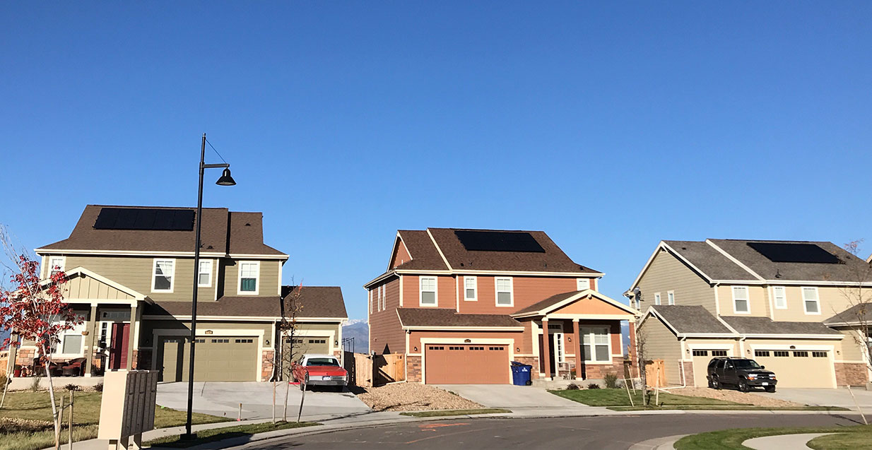 Solar installation on a residential home in Arizona with black solar PV panels